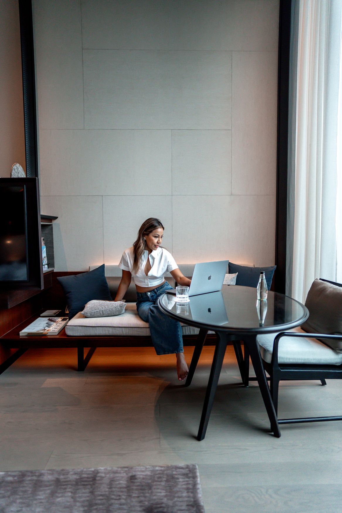 Ashley working in a luxury hotel lounge
